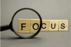 Microscope on the word Focus